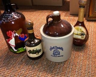 Jack Daniels Jug/Cookie Jar and Hand Painted Liquor Bottles Collection Set of 4             https://ctbids.com/#!/description/share/314022