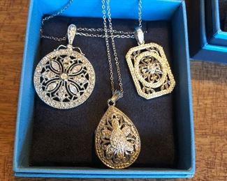 Sterling silver necklaces, some with diamond accents 