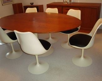 Saarinen dining room table and eight tulip chairs