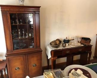 Small hutch with matching serving table filled to the brim with beautiful unique pieces