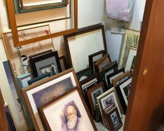 Closet filled with paintings and frames, art accessories