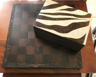 ZEBRA SKIN COVERED BOX OF CHESS PIECES AND WOOD BOARD