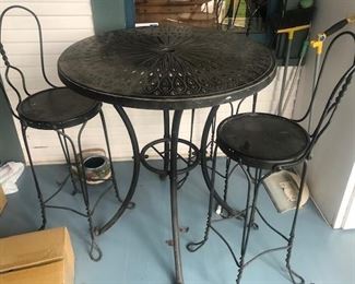metal table and 2 wrought iron chairs circa 1930 $250