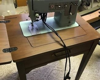 Singer sewing machine with table