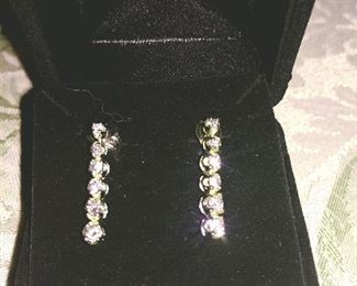 1/3 to 3/8 approx. Dia. Weight. Earrings. 14kt. I had them rhodium over yellow gold. 
