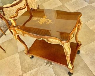 Italian Ormolu, inlay bar cart on wheels with carved gilt gold accents