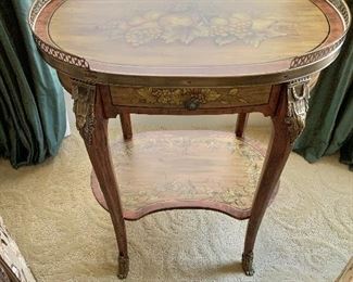 Floral accented ormolu side table