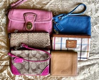 Coach clutches, wallets and more