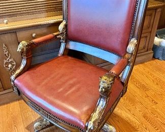 Maitland-Smith hand carved Napoleon brown finished mahogany desk chair with gilt detail and brass mountings