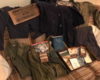 Korean War uniforms, Air Force Manuals, Pins, Ribbons, Personal Letters, and a box full of great stuff.  Sold as a lot Only