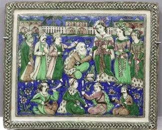 A Persian Glazed Ceramic Tile, Early Qajar Dynasty. Rectangular form with multi-color glaze including azure blue, emerald green, puce, and white and portrays a Religious scene, showing a woman (possibly Shirin, the Christian wife of Khosrow II), wearing a cross pendant around her neck, administering the Eucharist to an elderly man who is kneeling before her, with attendants surrounding them. Qajar Dynasty, 1789-1925. Crazing, some nicks/chips around the edges, small firing crack at the lower margin. 17 x 14" high.