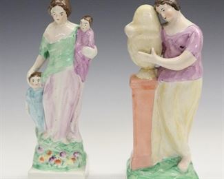 Two 19th century Staffordshire figures representing "Mourning" and "Charity". Molded bodies on square plinths with polychrome decoration. Minor surface wear. Up to 7 1/2" high.