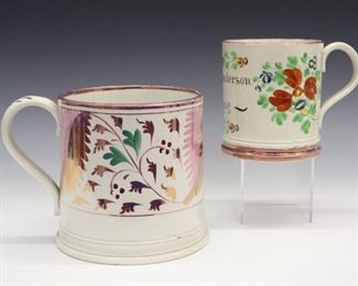 Two 19th century English Pearlware mugs with Pink lustre decoration and enameled detail. All with flowers and foliage the smaller probably an engagement gift reads "Andrew Anderson & Bell Young". Wear, crazing, light surface scratches, minor spout flakes, the larger with two shallow flakes under foot rim and a small flake/hairline at the molded base. Up to 6" high.