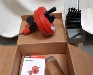Power spin drain cleaner by Ridgid and 17 piece drill kit.