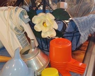 Check out those orange retro Tupperware measuring cups