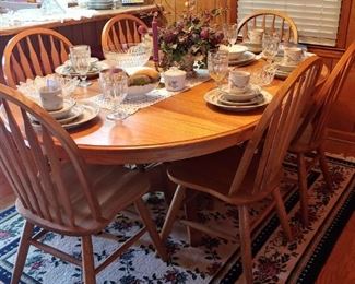 Beautiful solid oak dining room table with Windsor style chairs