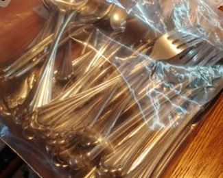 Large set of Oneida scalloped flatware 45 pieces