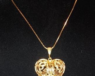 Pretty gold plated filigree heart