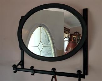 Beautiful oval mirror coat rack