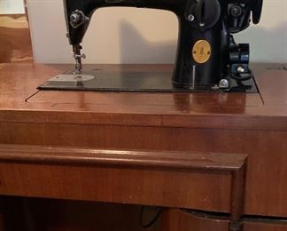 Singer machine in an Art Deco cabinet ( the machine works!)