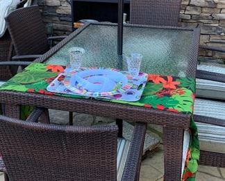 Two rectangular patio sets, each with six chairs