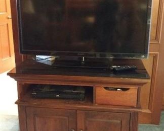Flat screen tv and cabinet