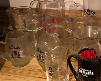 vintage glass cocktail pitchers.  Including one from Playboy.