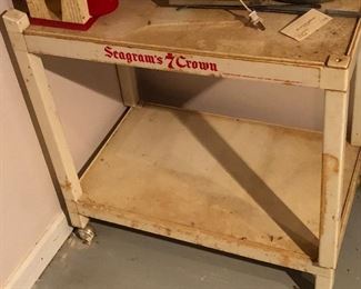 Seagrams rolling bar cart.  A little dirty but we hope to have it clean and ready for you!!
