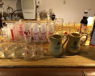 Many sets of vintage bar glasses