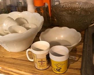 Milk Glass Punch Bowl. Small Glass Punch Bowl.  These are two of the smaller Punch bowls.  There are two other larger ones.  1958 thermo Charlie Brown Mug