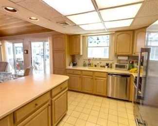 Nice kitchen cabinets; stainless steel GE Profile dishwasher