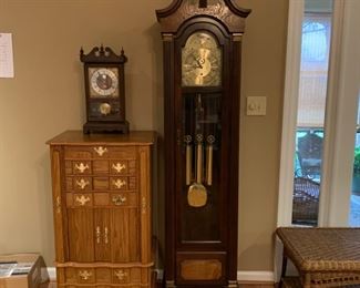 #12	The Steinway Co Clockmakers grandfather clock series 111.  With wind up key and booklet.  20"x11"x77"	 $200.00 


