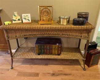 #20	Rattan and metal console table 48"15"x29"	 $40.00 
