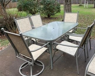 #57	Outdoor dining table with 6 chairs- two swivel, with cover	 $75.00 
