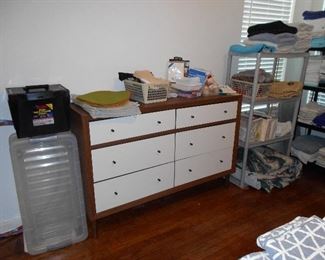 dresser, storage containers, linens, etc.