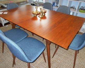 great looking table with leave, chairs are NFS