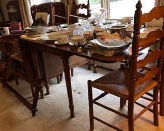 Drop-leaf table, extra leafs, chairs, cushions, etc.