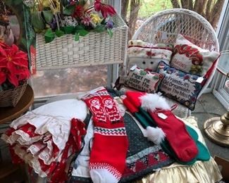 Wicker chair, coffee table, plant stand, tree skirts, Christmas stockings