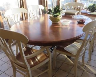 54" Round Table with 1-20" leaf with 2 Hosts and 4 Side Chairs