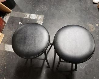 (2) Cosco Black metal frame Black vinyl padded seat folding chairs