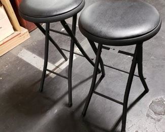(2) Cosco Black metal frame Black vinyl padded seat folding chairs