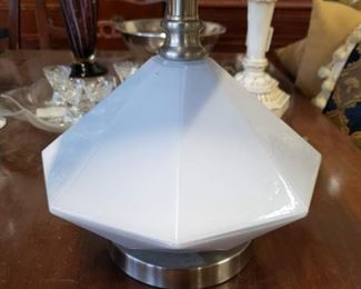 White ceramic base table lamp with burgundy shade