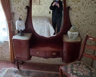 Antique dresser, chair, beautiful rug, lamp, jar