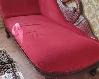 Beautiful antique couch ( the white area is the light from window) Rug in picture also for sale.