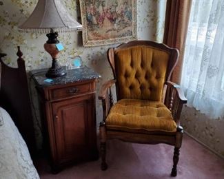 Antique chair, night stand, lamp, tapestary with rod, bed frame, mattress & bedspread.