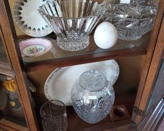 Beautiful curio & lots of top of the line crystal  including Waterford.  China plates.