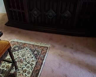 Large antique stero,  antique irons ( they actual open ), rug & China serving dishes.