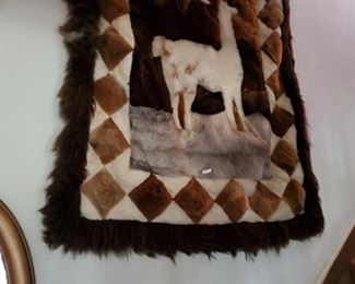 Fur rug or can be used as a wall hanging