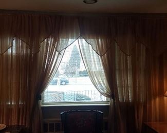 All window treatments are available for sale. Please ask first before they come down