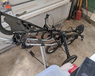 Those are both Sun Mountain Golf Bag Caddys!